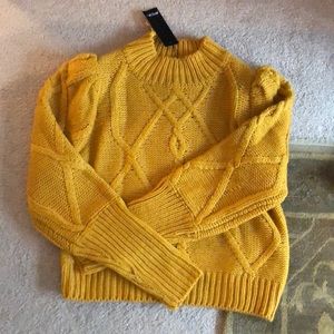 Chunky puff sleeve cable sweater